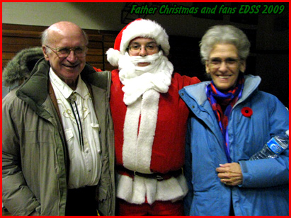 Grandpa and Nanny pose with Father Christmas