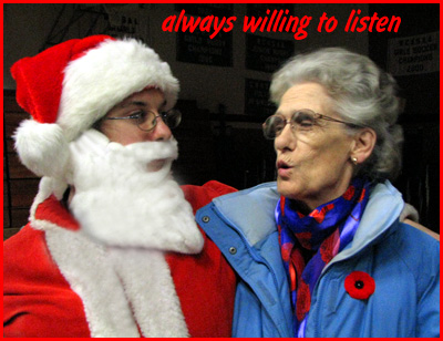 Father Christmas (Willem) listens to a little girl's Christmas wish (Nanny)